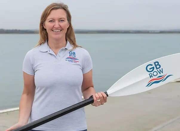 Female ocean rower Emma Wolstenholme holding a rowing oar