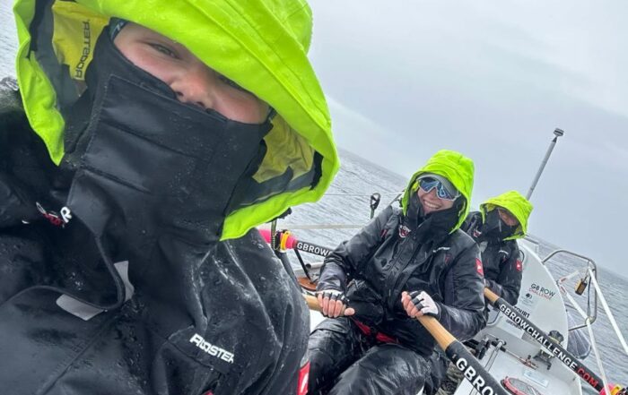 Rowing in the rain in full wet weather gear