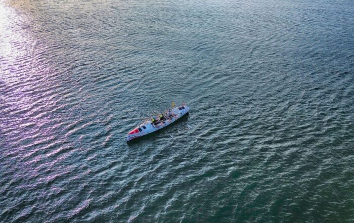 Rowing boat on the ocean taken by a drone