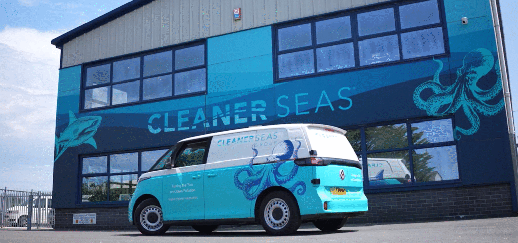 The HQ of Cleaner Seas Group with their electric van parked in front.